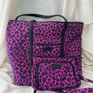 Vera Bradley purple and black leopard print travel bag and cross body purse.